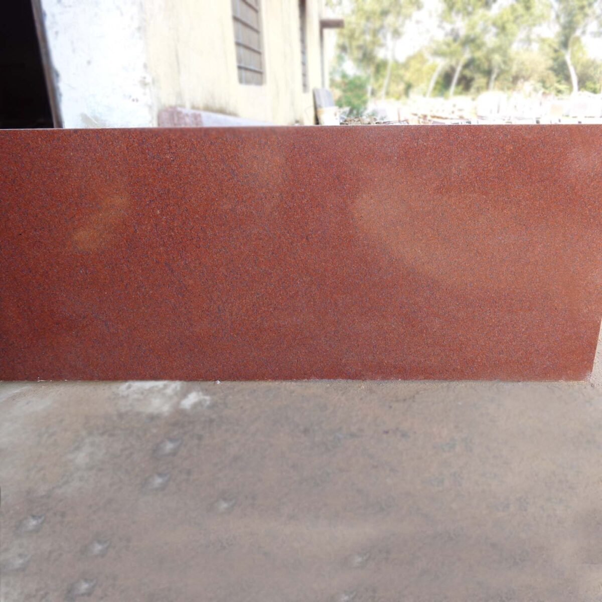 Jhansi Red Granite Slab with Bold Red and Black Speckles