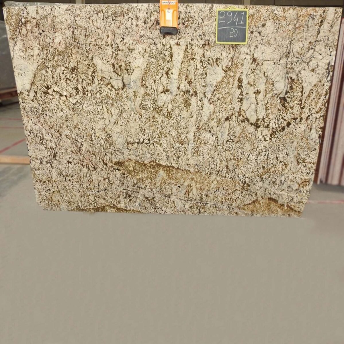 Polished Bianco Gold Granite slab with gold and grey veining