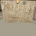 Polished Bianco Gold Granite slab with gold and grey veining