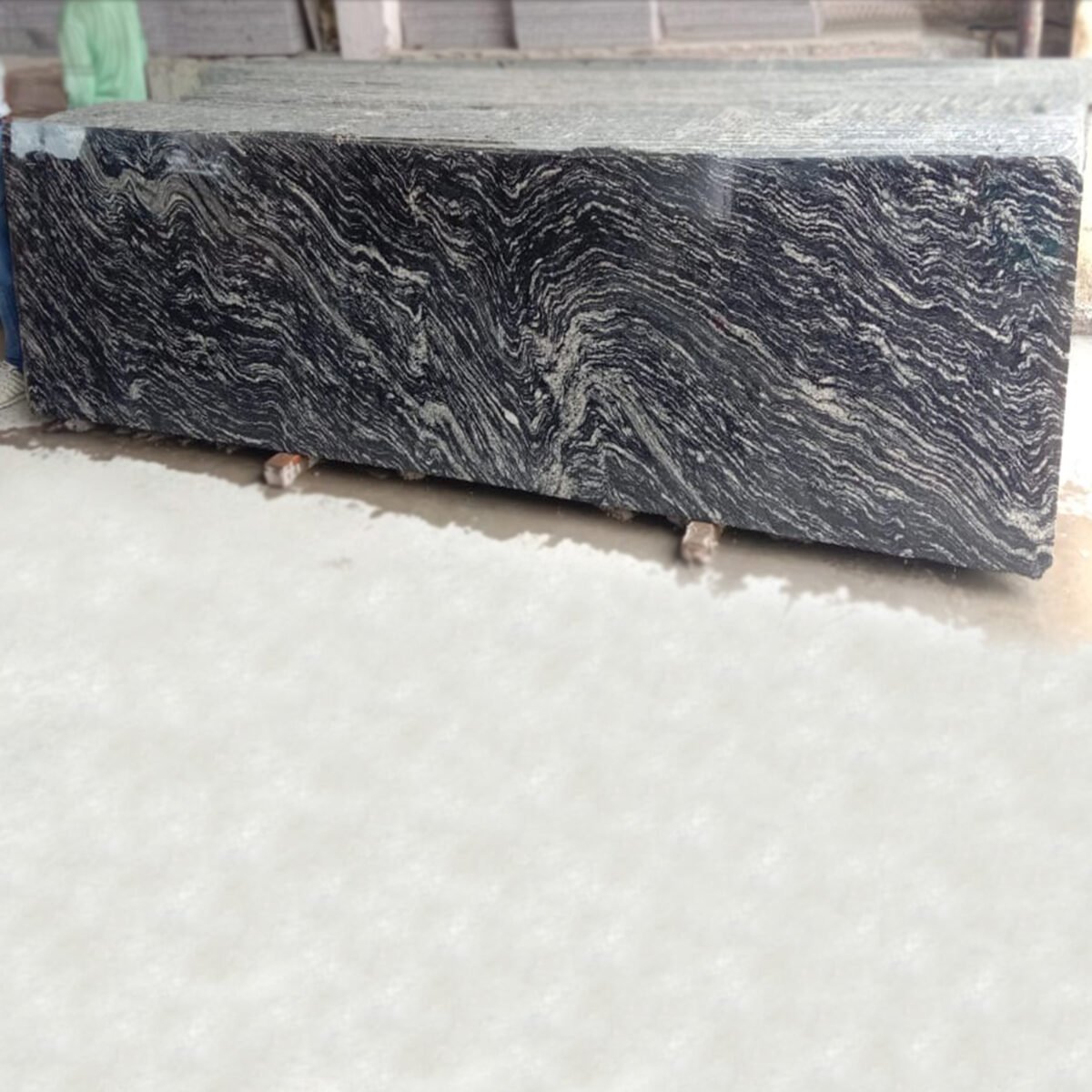 Black Marcino Granite slab with natural white veining