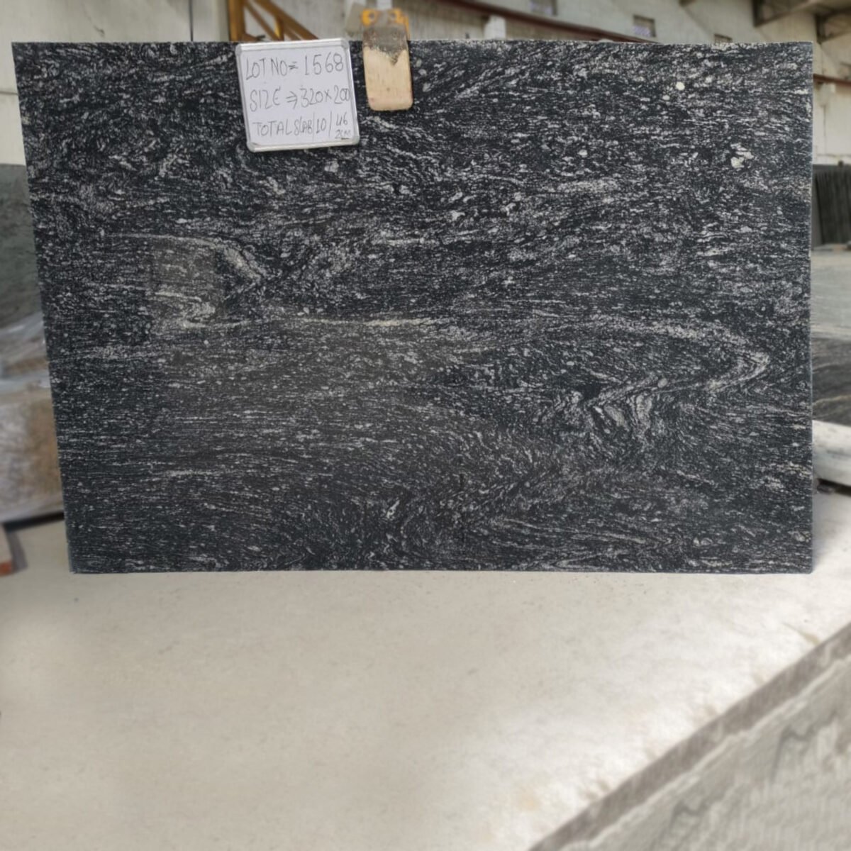 Black Marcino Granite slab with natural white veining