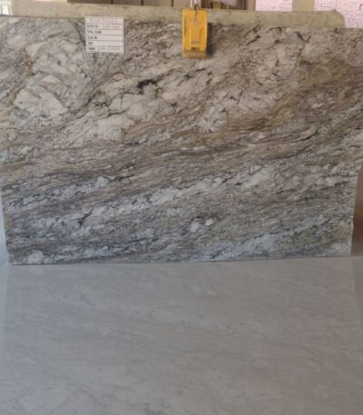 Blue Dunes Granite slab with flowing blue and beige patterns
