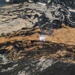 Fusion Gold Granite Slab with Golden and Beige Waves