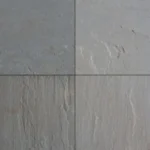 Kandla Grey Sandstone paving tiles with riven texture