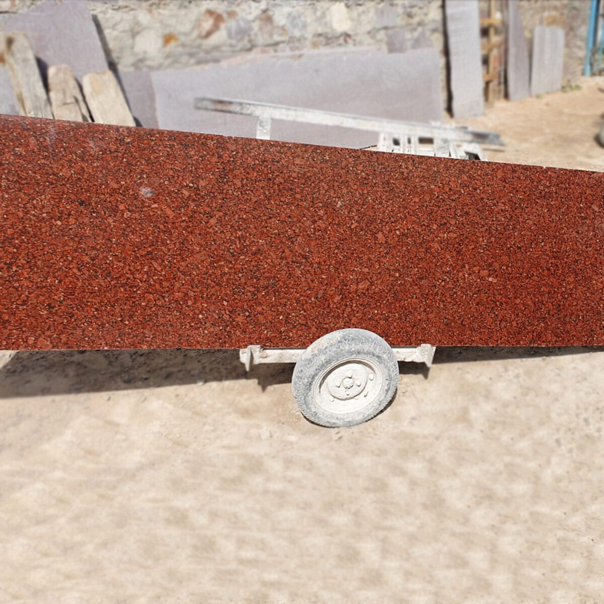 Red Granite Countertop with Black and White Flecks
