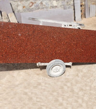 Red Granite Countertop with Black and White Flecks