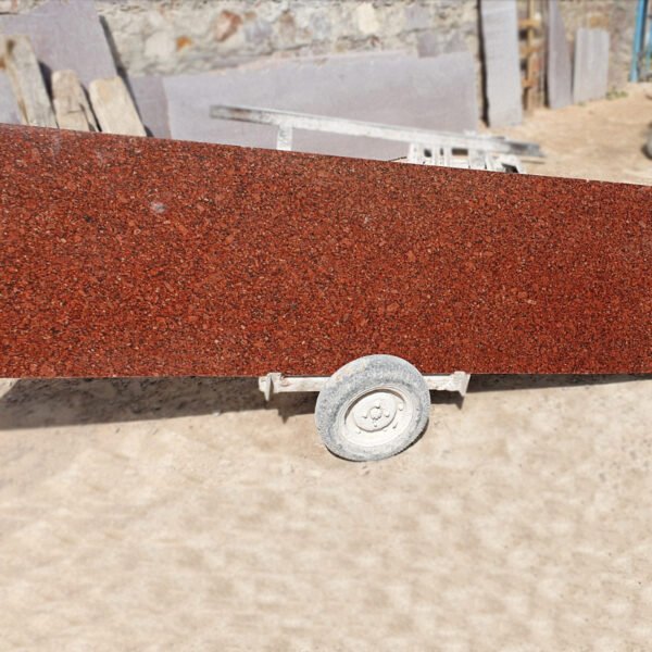 Red Granite Countertop with Black and White Flecks