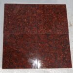 Red Granite Countertop with Black and White Flecks