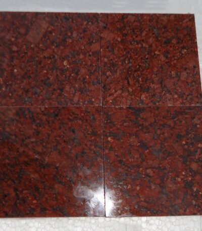 Red Granite Countertop with Black and White Flecks