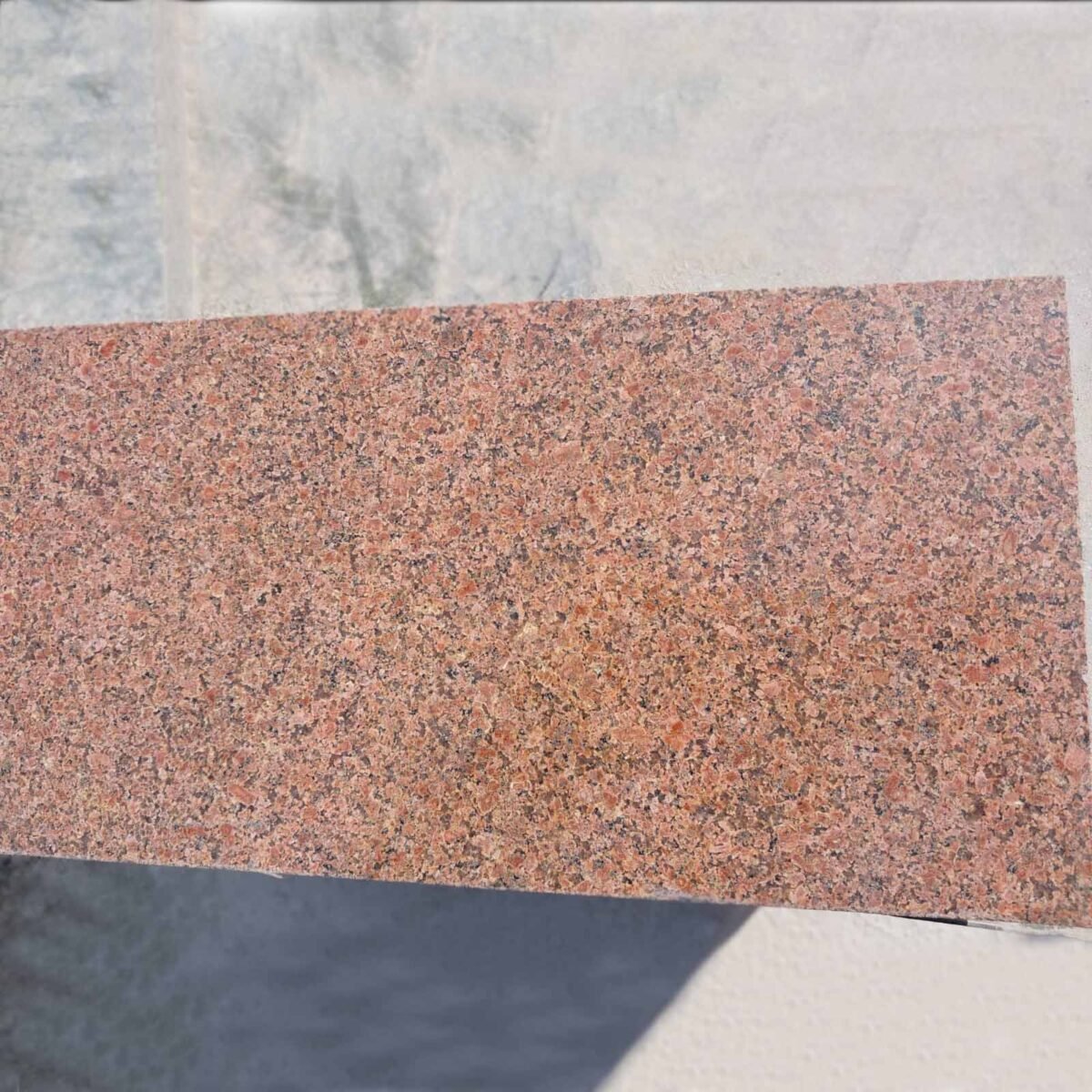 Polished Onida Orange Granite Slab with Black Flecks