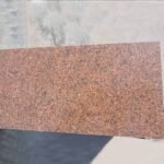 Polished Onida Orange Granite Slab with Black Flecks