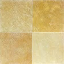 Yellow limestone paving slabs with natural textured finish